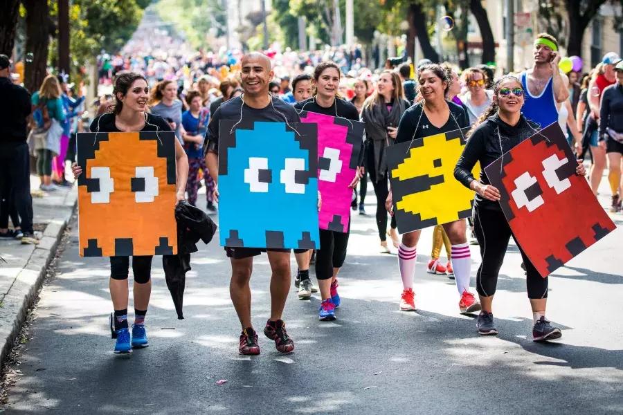 Runners dressed in Pac Man costumes for Bay to Breakers Race SF